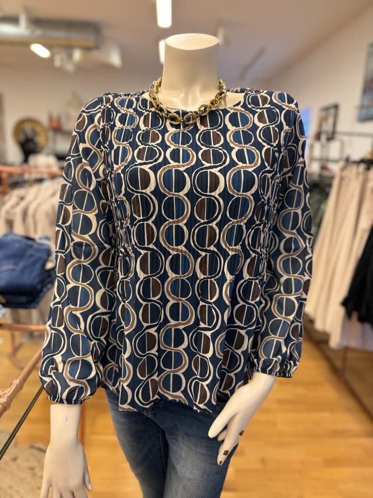 Blus med cirkelmönster